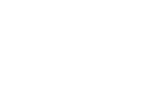 White logo with the words Member of Feeding America. The I in Feeding is stylized as a wheat stalk. The background is transparent.